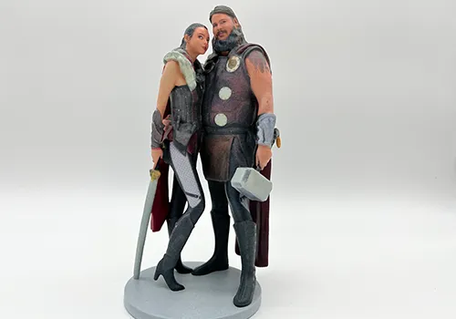 3D-printed replica of a couple in Viking and warrior cosplay costumes